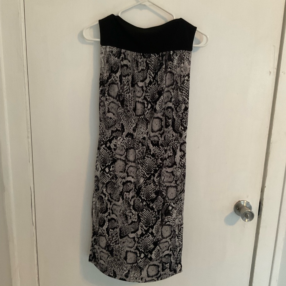 BCBGMAXAZRIA dress.  Size XS in a black snakeskin pattern.  Very sleek!